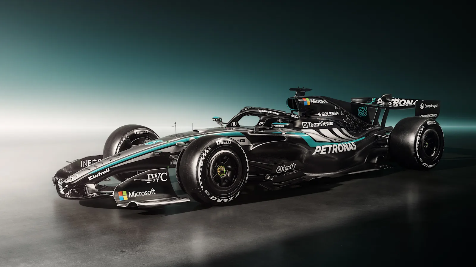 2026 Mercedes W17 官方发布图，车身可见 PETRONAS、INEOS、Microsoft 等真实赞助商标识
